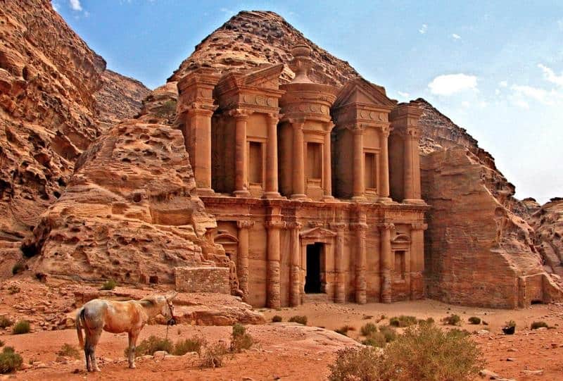 Ancient city of Petra carved into red rock in Jordan